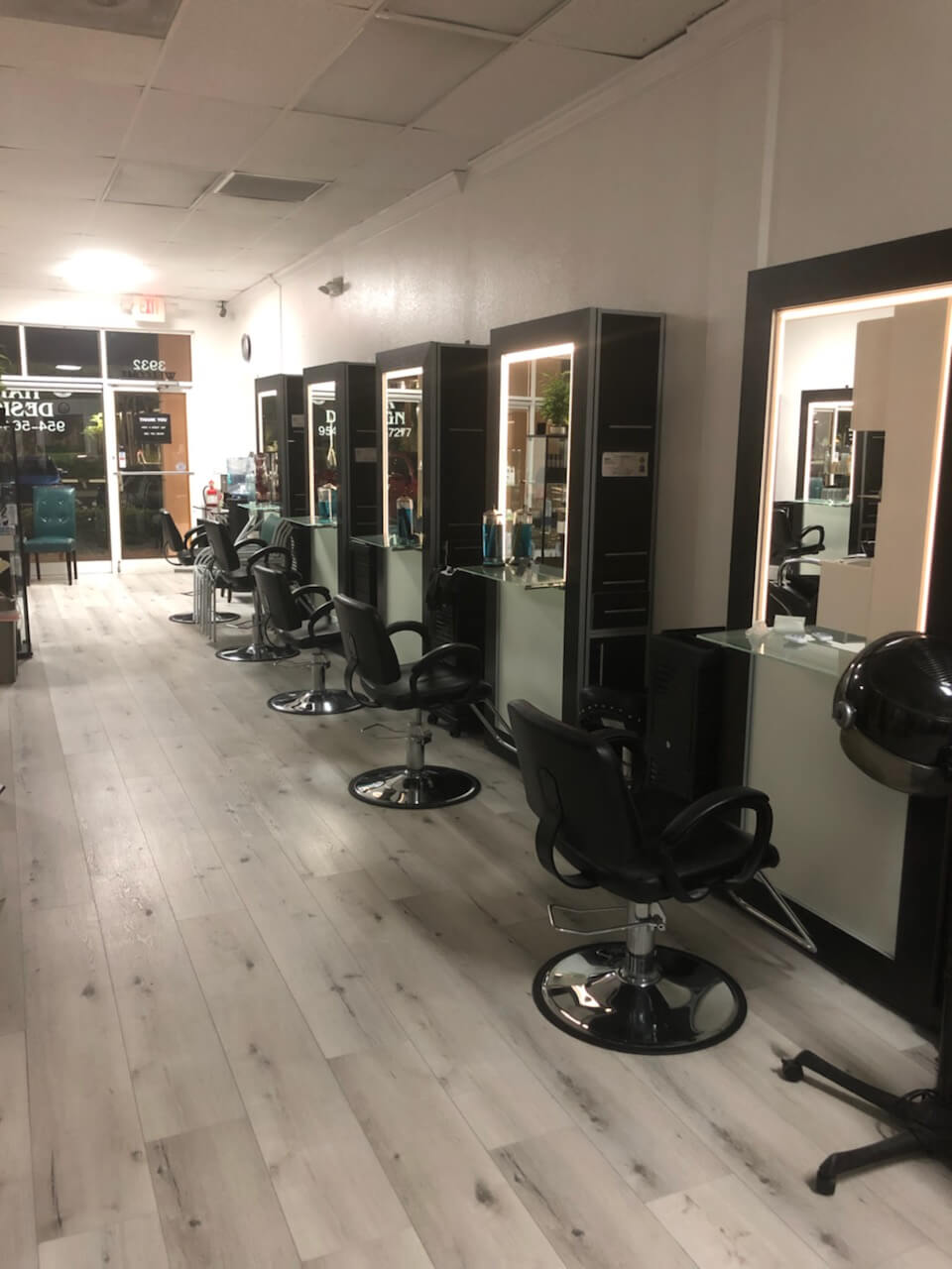 Modern hair salon stations at Pizzazz Beauty Salon.