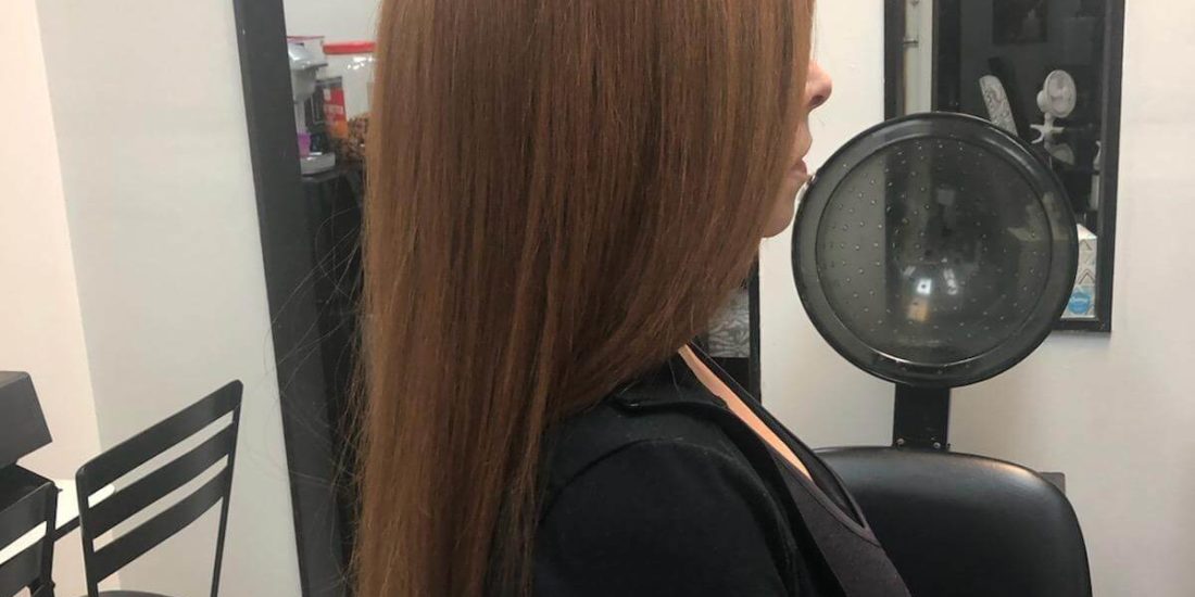 Long, silky smooth hair after a keratin treatment.